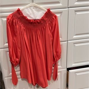Acrobat Coral/Salmon colored off the shoulder blouse. Size XS